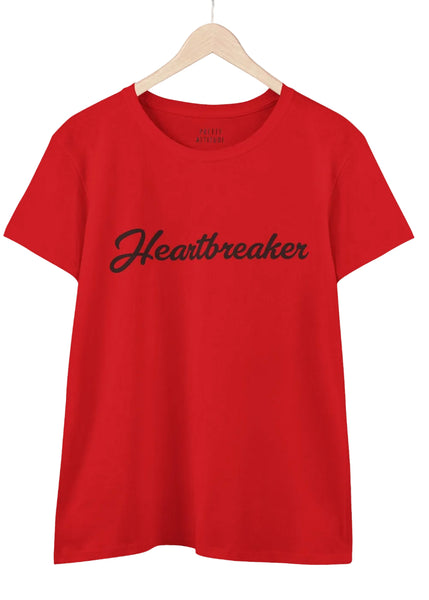 Red t-shirt with 'Heartbreaker' text on a hanger against a white background
