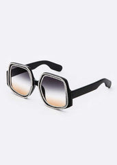 oversized sunglasses with crystal pave details - side angle view

