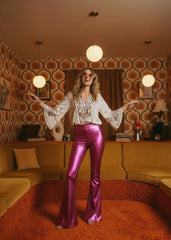 Pink metallic flare pants back view – vintage bell bottom silhouette, pull-on design