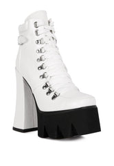 White platform combat boots with lace up design and chunky heel