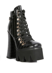 Black platform lace up biker boots with chunky block heel and metal eyelets"