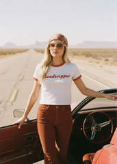 White and red cropped ringer shirt with Roadtripper graphic for boho road trip outfits