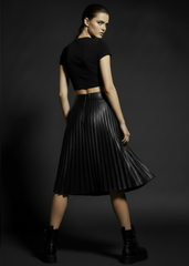 Black faux leather mini skirt styled with boots – rock-n-roll goth outfit
