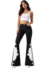 Black bell bottom jeans with white crocodile embellishment – back view