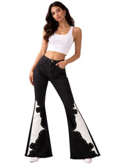 Women's black flare jeans with silver studs and crocodile panels – side view
