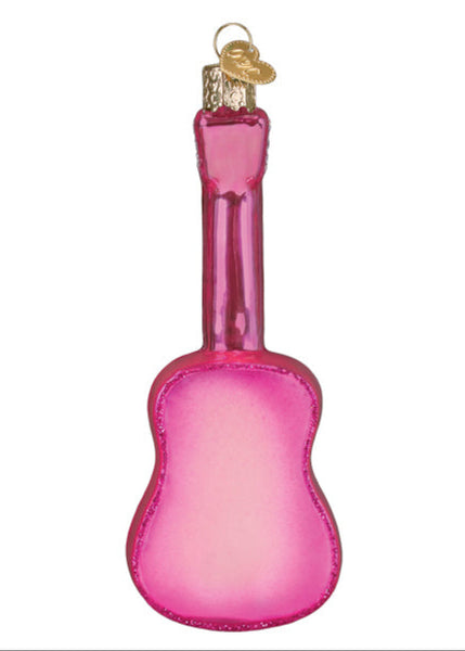 Pink glass guitar ornament on a white background