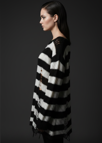 Women’s black and white striped oversized sweater with distressed holes and alternative punk rock design