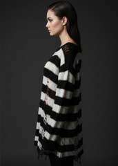 Women’s black and white striped oversized sweater with distressed holes and alternative punk rock design