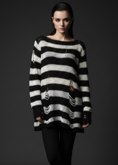 Black and white striped distressed knit sweater with ripped details and oversized gothic grunge style