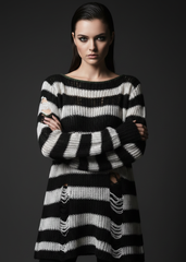 Gothic black and white striped knit sweater for women with ripped distressed details and long sleeves