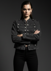 Black military jacket styled with leather trousers and band tee — women's gothic rock fashion
