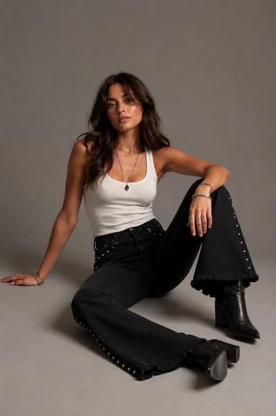 Women's black high-rise flare pants with frayed hem and stud embellishments – Pretty Attitude boho style