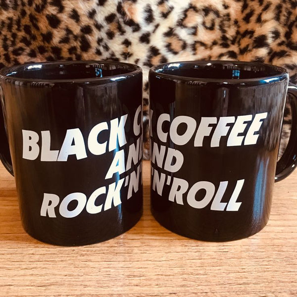 Two black ceramic mugs with white typography on wooden surface — Black Coffee and Rock'n'Roll Mug 11oz and 15oz
