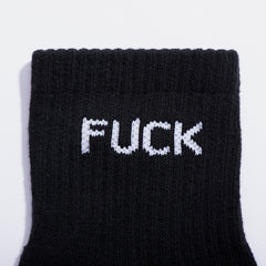 Black sock with white text on a light gray background