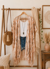Shimmering rose gold sequin fabric detail on open front kimono duster