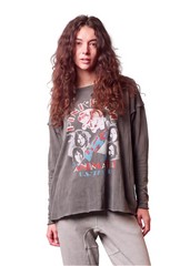 Model wearing a charcoal gray Pink Floyd Animals long sleeve top with a relaxed fit and colorful band graphic