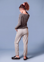 Back view of the charcoal gray Pink Floyd Animals long sleeve top, showing exposed seams and a relaxed fit.
