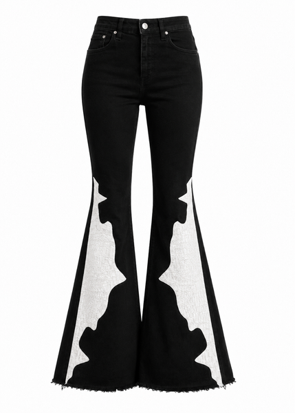 Black bell-bottom jeans with white cow print on a white background