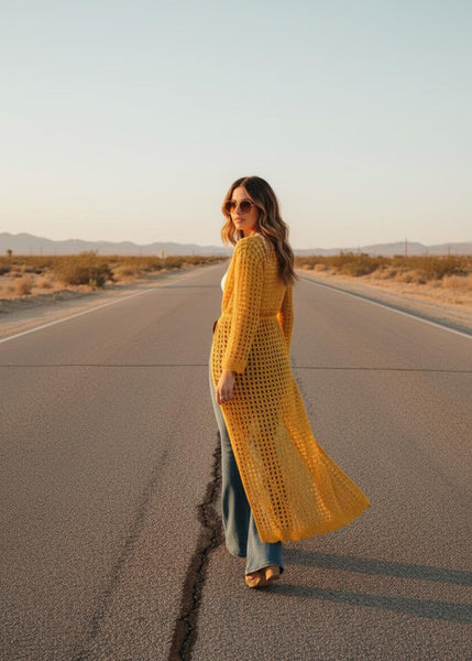 Yellow crochet maxi kimono cardigan worn open front, floor-length boho beach cover up
