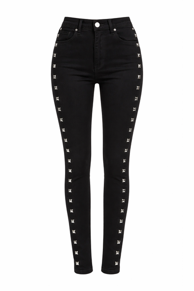 Edgy black studded skinny jeans for women with rock on design, punk goth denim pants for concerts, festivals and alternative fashion outfits.