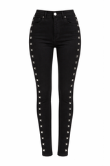 Edgy black studded skinny jeans for women with rock on design, punk goth denim pants for concerts, festivals and alternative fashion outfits.