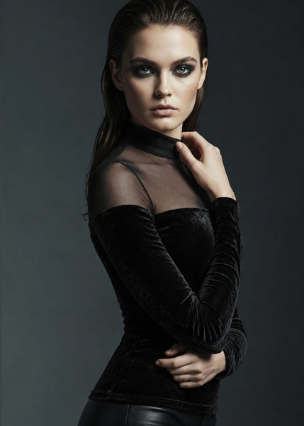 Fitted black velvet turtleneck top with long sleeves and floral burnout mesh design