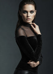 Fitted black velvet turtleneck top with long sleeves and floral burnout mesh design