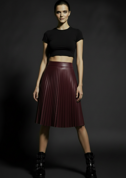 Burgundy pleated faux leather midi skirt with high waist and flowing A-line silhouette