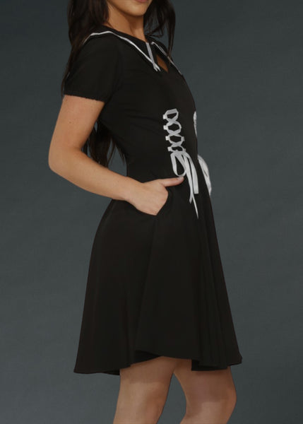 elegant black gothic dress with white corset lacing and piping details