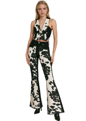 Women’s cow print bell bottom jeans with faux cowhide front inserts, 32-inch inseam, western-inspired stretch denim made in the USA.