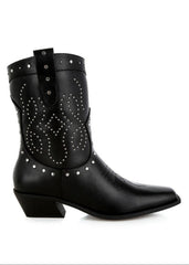 Black cowboy boots with studded details on a white background