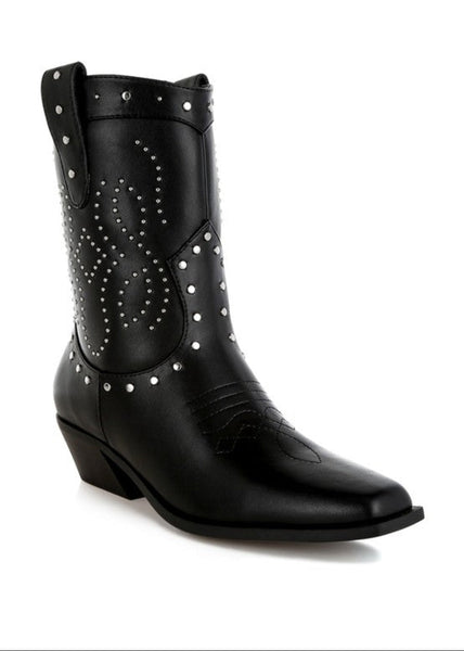 Black cowboy boot with silver studs on a white background