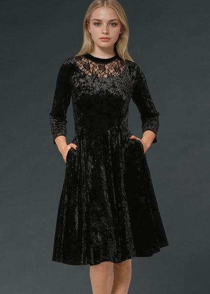 Long sleeve black velvet gothic dress with lace details, elegant dark alternative fashion outfit for goth, punk, and Victorian inspired style