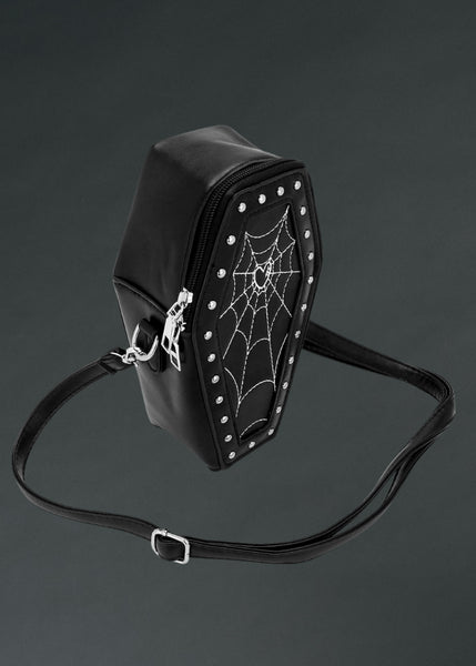 Black faux leather coffin-shaped crossbody bag with spider web design

