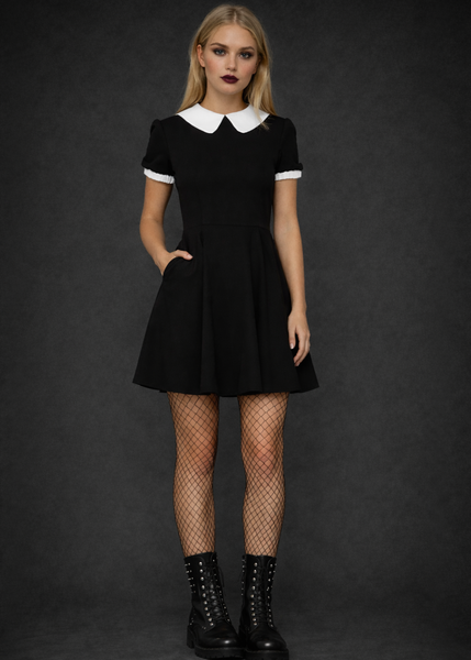 Black gothic dress with white Peter Pan collar styled with fishnet tights and combat boots, dark academia alternative goth outfit for women.