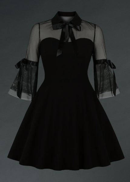 Black dress with sheer sleeves on a dark background wednesday collar velvet 