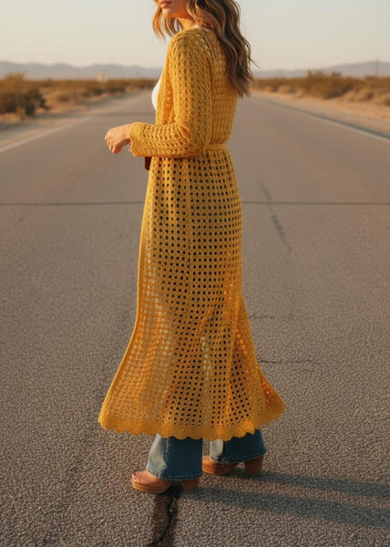 Back view of mustard yellow crochet open-weave kimono cardigan with long sleeves
