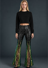 Ombre black and green sequin bell bottom flare pants, full length front view