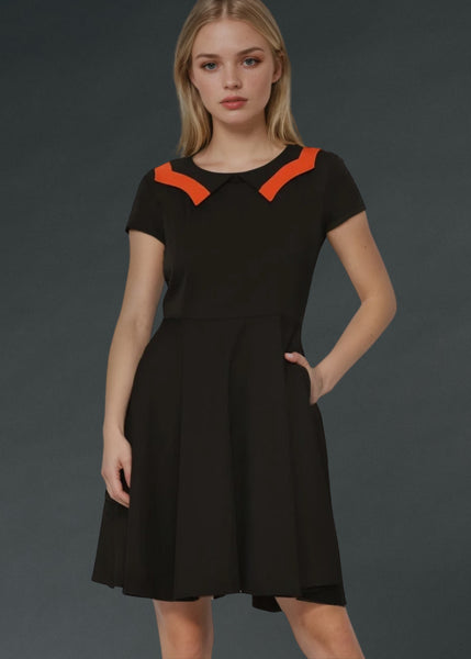 Women’s black gothic dress with classic collar and swing silhouette, edgy emo clothing with pockets for Halloween or everyday goth wear