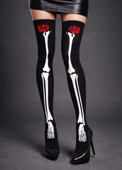 Skeleton over knee socks with skull bone print, gothic thigh high stockings for alternative fashion and Halloween outfits.