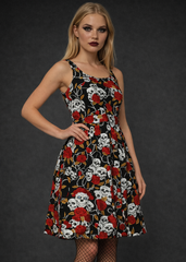 Gothic skull and rose print dress for women, alternative rockabilly style dress paired with fishnet tights and studded boots.