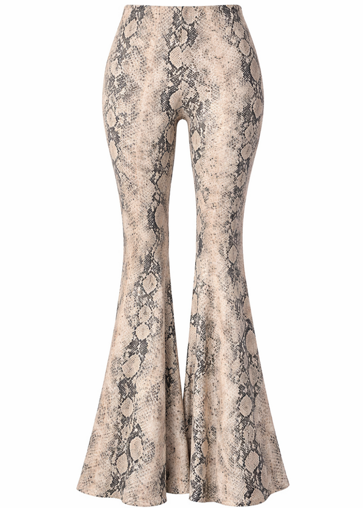 White snakeskin flare pants front view - 70s bell bottom pants with black snake print pattern"