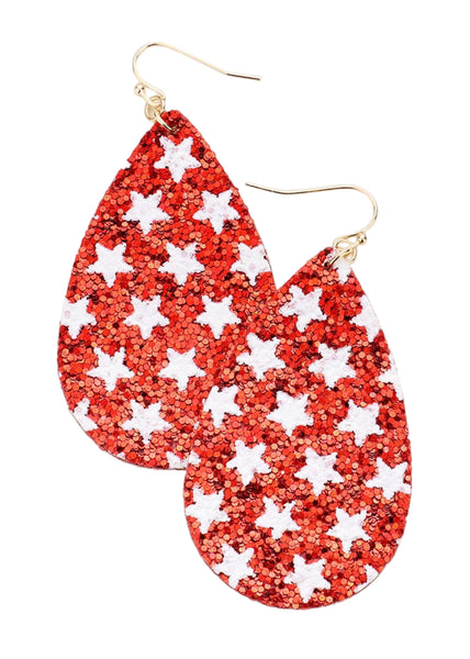 Teardrop-shaped earrings with red glitter and white star pattern on a white background