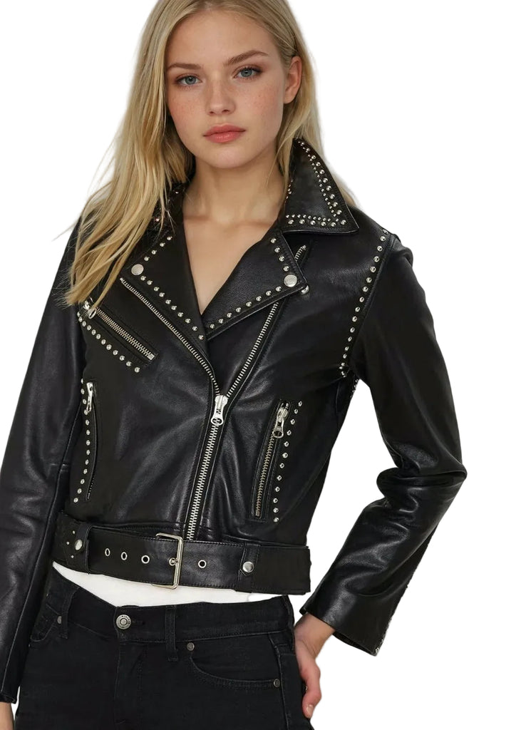Woman wearing a black leather jacket with studs rockstar studded concert outfit festival biker 