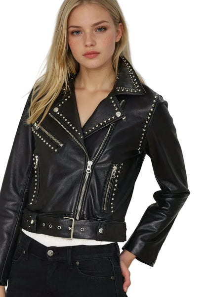 Woman wearing a black leather jacket with studs rockstar studded concert outfit festival biker 