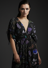 Alternative witchy maxi dress featuring snakes, mushrooms, crystals, potion bottles and dark forest botanical artwork