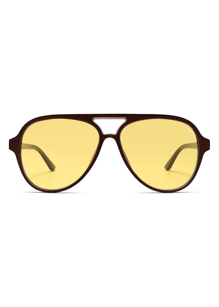 Aviator sunglasses with yellow lenses on a white background