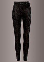  Black velvet high-rise leggings styled with silk cami and leather jacket — dark rock-luxe editorial