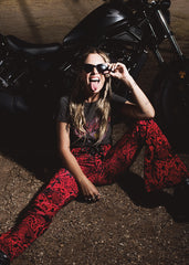 red snake print flare pants